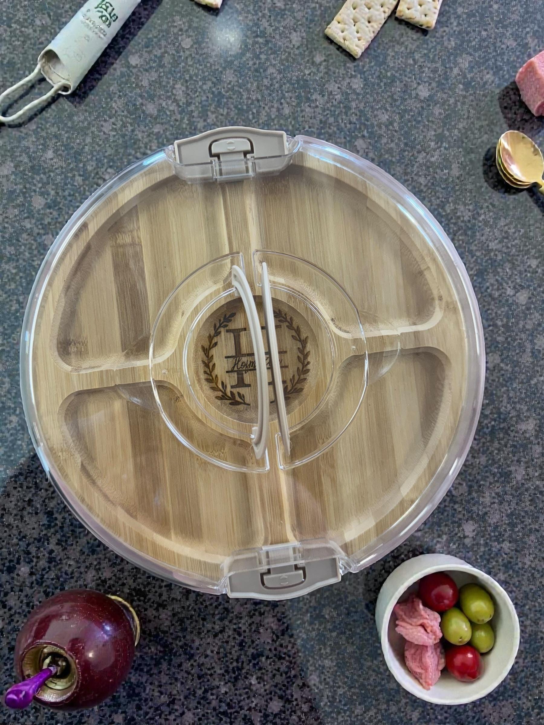 Engraved bamboo divided snack tray used for charcuterie and appetizers
