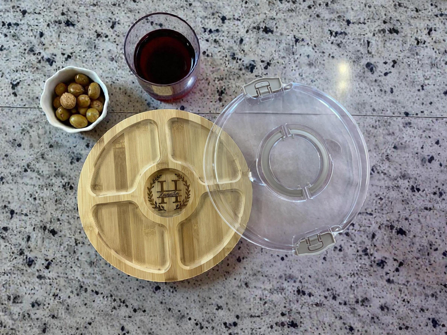 Personalized bamboo serving tray with removable clear lid shown open with snack